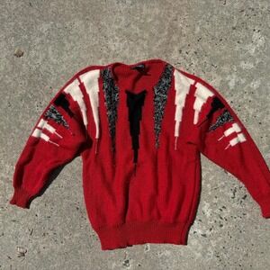 intage red sweater with grey, white and black pattern‎